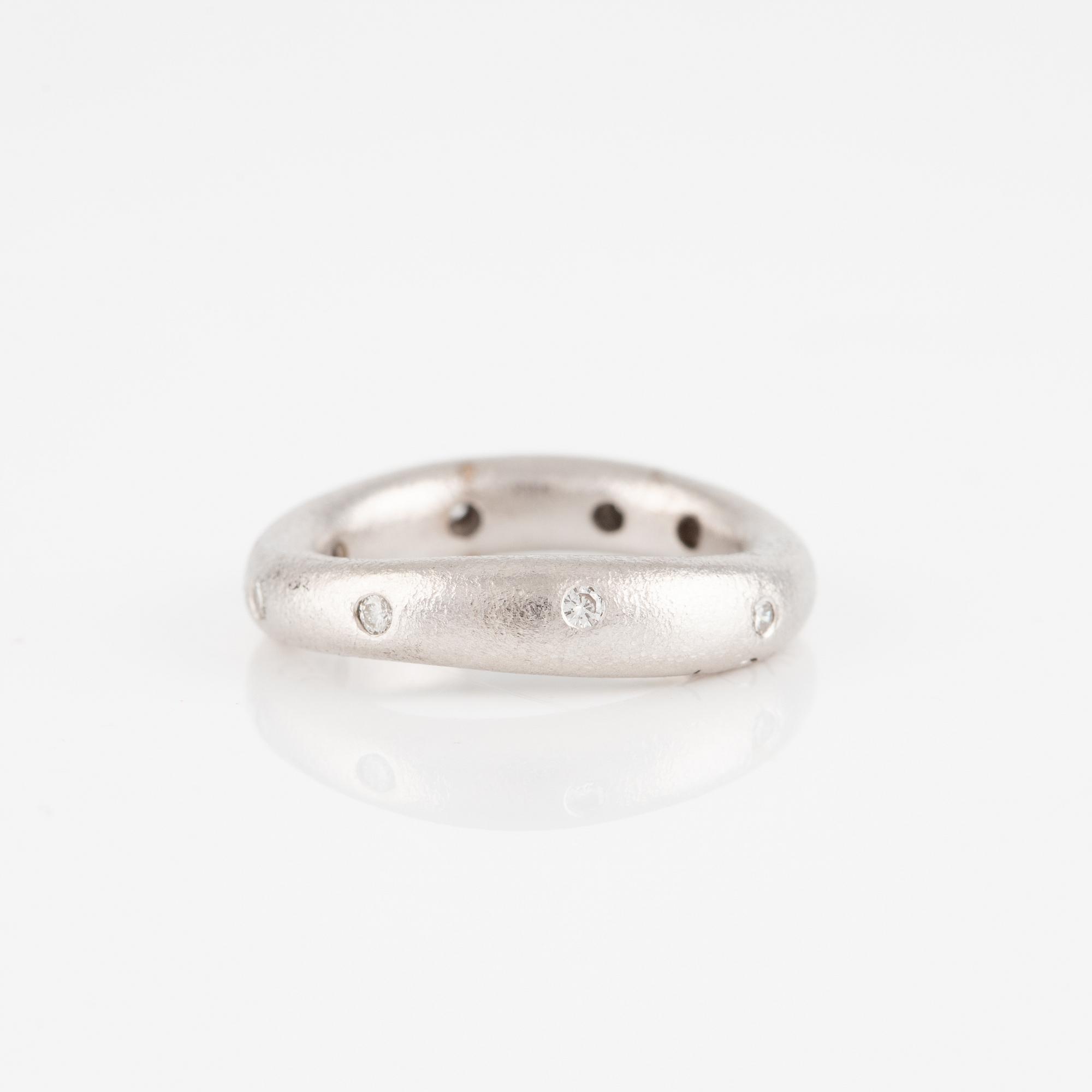 Ole Lynggaard two "Love" rings no. 4 in 18K white gold with round brilliant-cut diamonds.