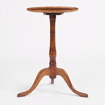 A burr-alder tilt-top table by J. Sjölin (master 1767-1785).