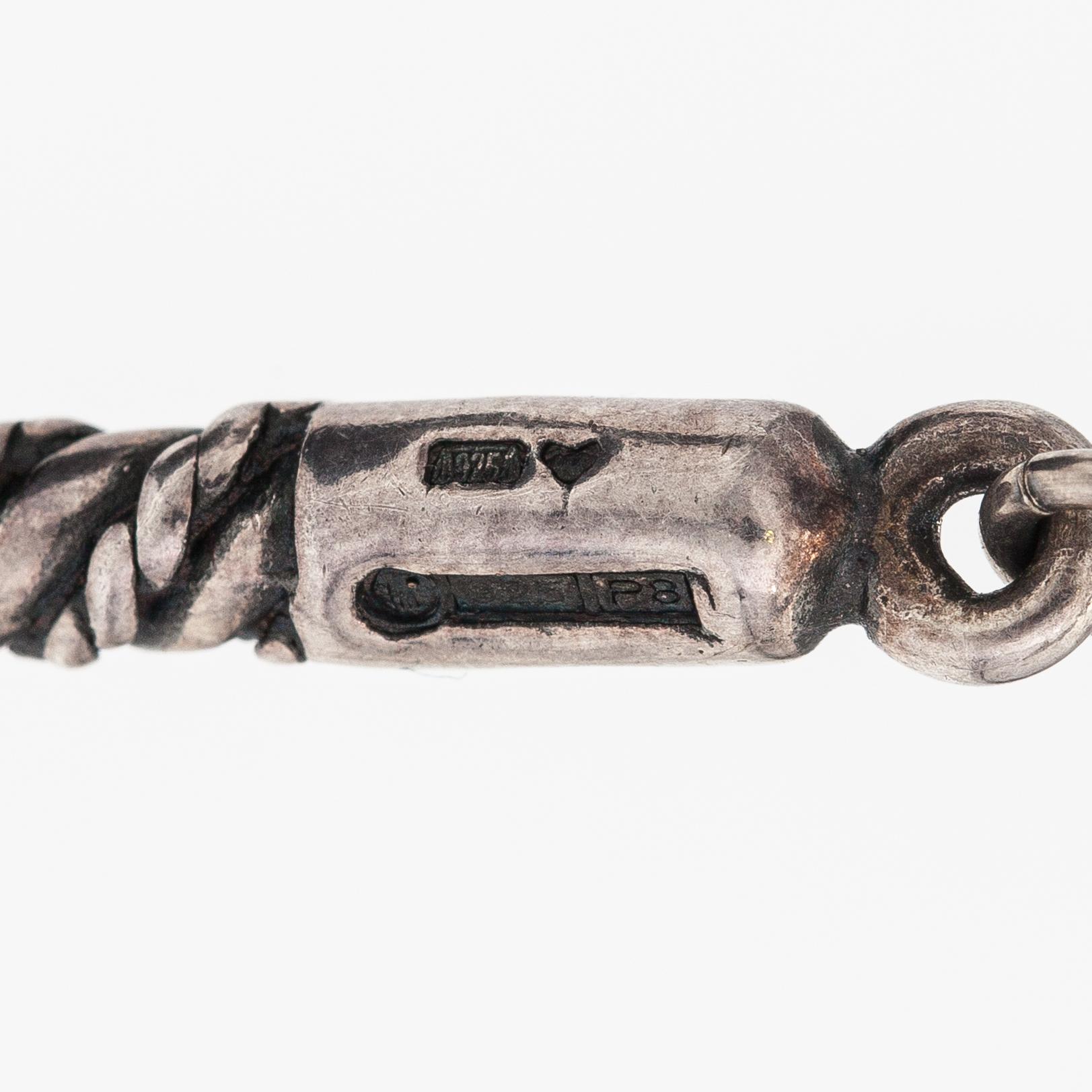 A sterling silver necklace "Twined jewellery from Lampola in Halikko". Kalevala koru, Helsinki 1992.