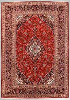 A Keshan rug, 345 x 236 cm.