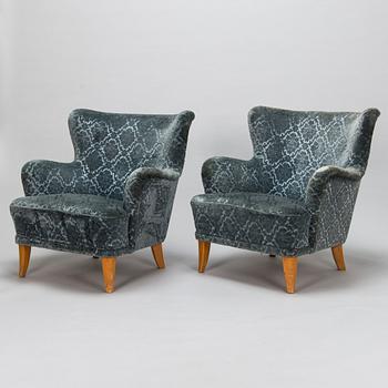 Ilmari Lappalainen, a pair of 1950's 'Laila' armchairs for Asko, Finland.