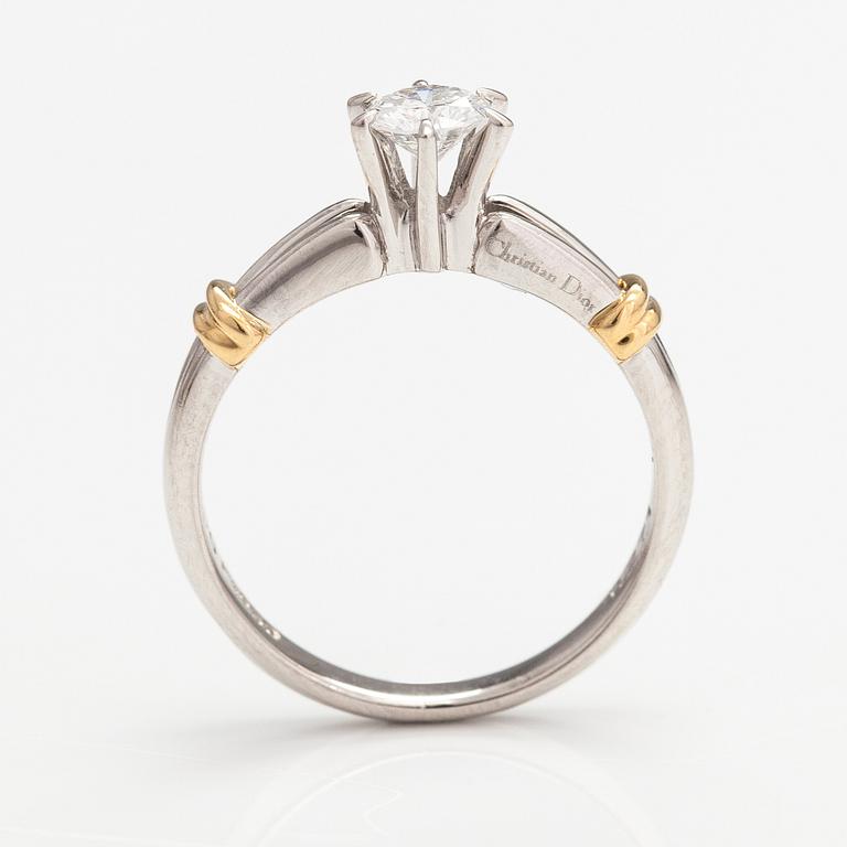 Dior, An 18K gold and platinum ring with a ca. 0.271 ct diamond. Marked CH Dior, 542.