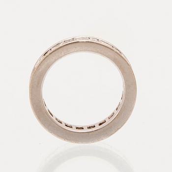 An 18K white gold eternity ring set with baguette and princess cut diamonds by Hartmann's Denmark.