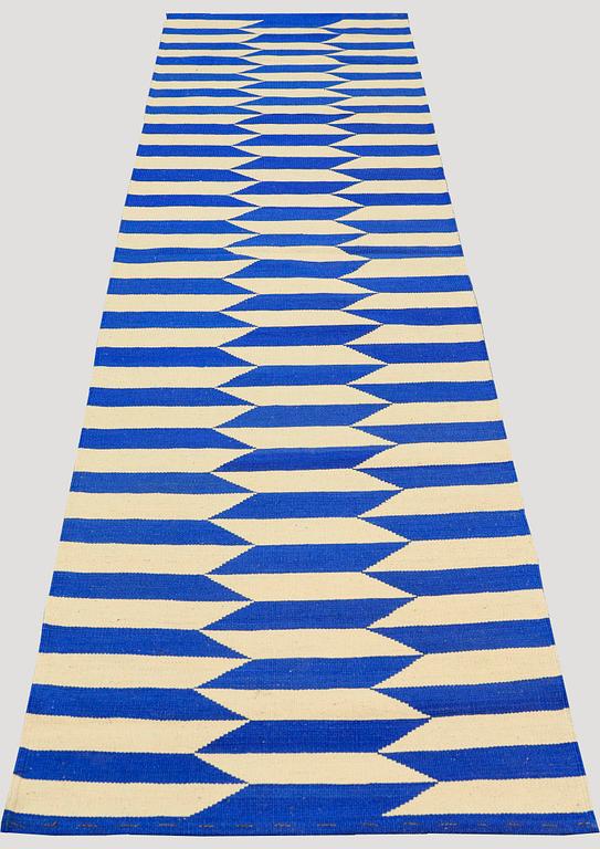 A runner, flat weave, ca 298 x 82 cm.