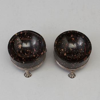 A pair of late Gustavian porphyry and silver salts. Silver maker's mark by Adam Tillström, Växjö 1799.