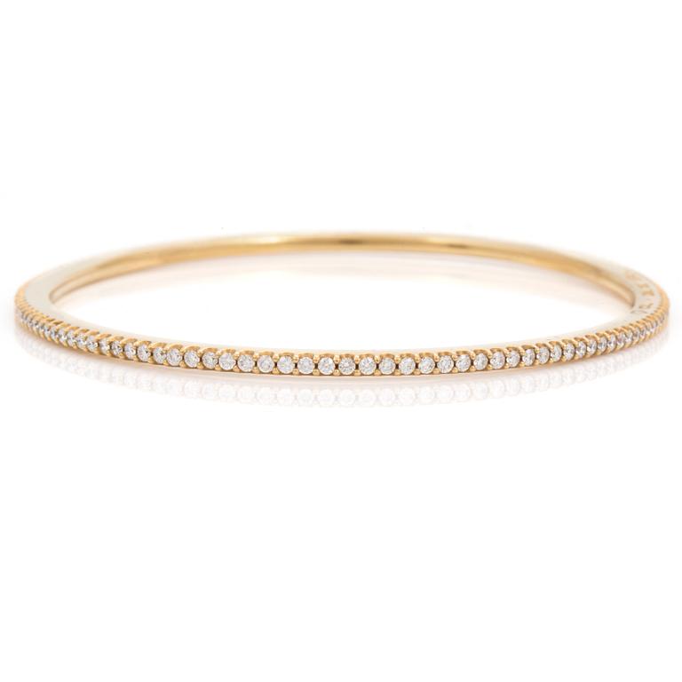 A brilliant cut diamond "Love bracelet" bangle by Ole Lynggard.