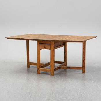 A 19th century gate-leg table.