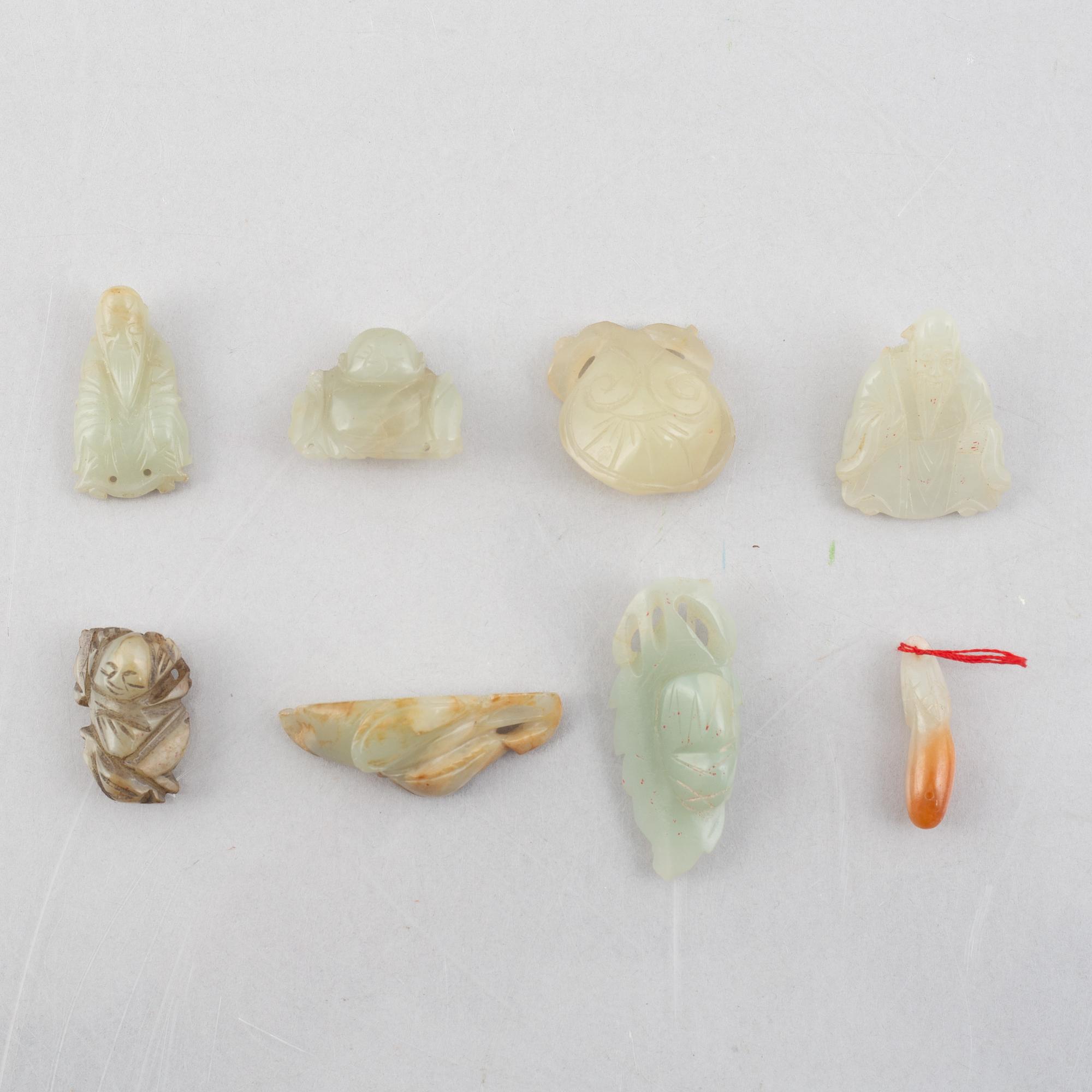 A group of eight Chinese stone charms, 20th century.