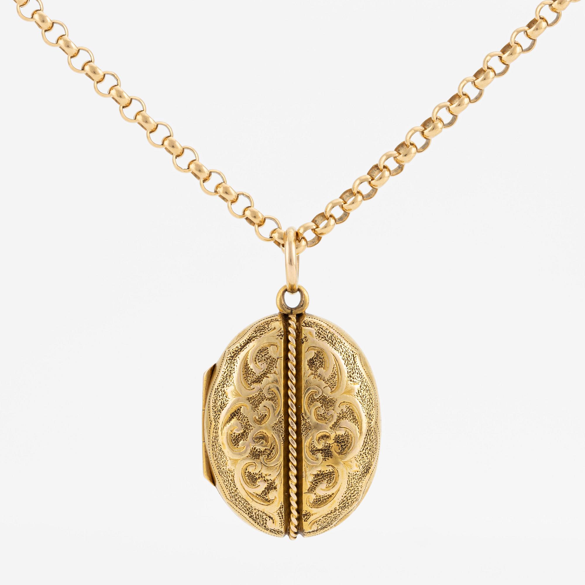 Öppningsbar medaljong med kedja, 18K guld.