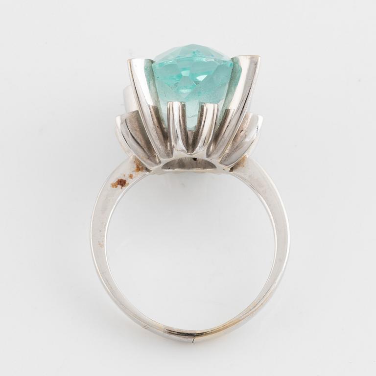 White gold and aquamarine ring.