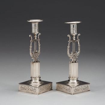 A pair of Swedish 19th century silver candlesticks, makers mark of Johan Petter Grönvall, Stockholm 1823.