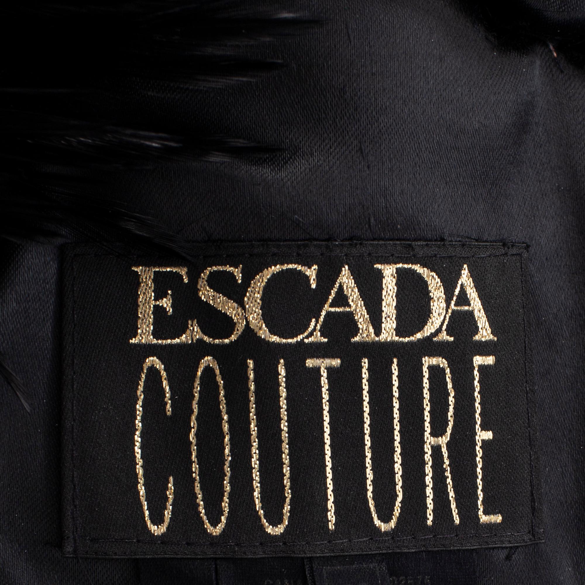 ESCADA COUTURE, a wool dress with feather collar, size 40.