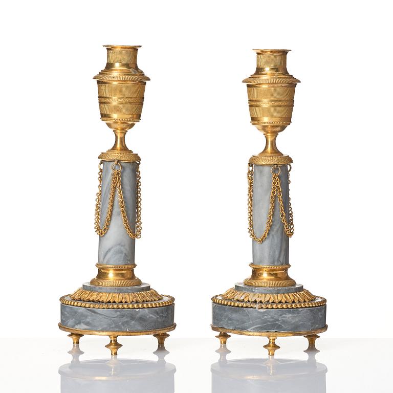 A pair of Louis XVI ormolu and marble cassolettes, late 18th century.