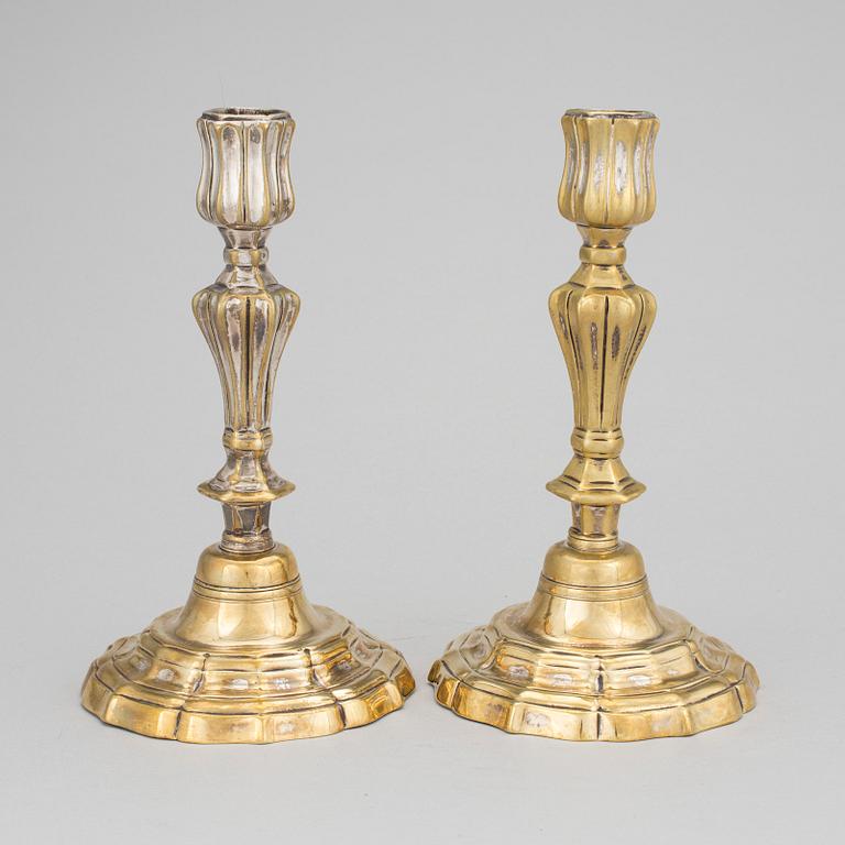 A pair of argent haché candlesticks, mid 18th century.