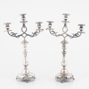 A pair of silver-plate candelabras, early 20th century.