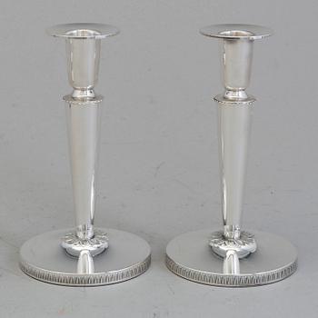 CANDLESTICKS, two pairs, second half of the 20th century.
