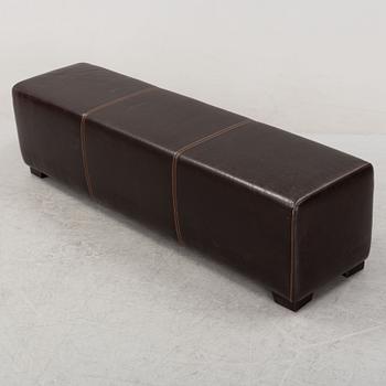 A leather-upholstered bench from Industria Divani e Poltrone, Italy.