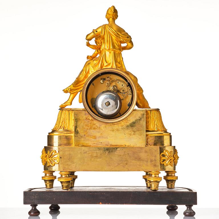 A French Empire 19th century gilt bronze mantel clock.