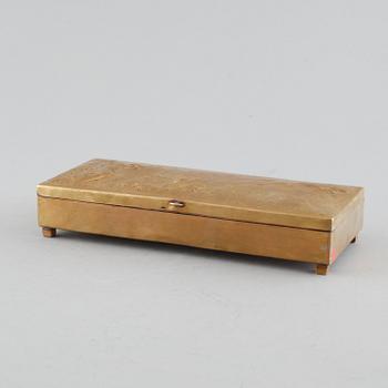 A brass coated copper cigarbox dated 1942 and signed B.S-n.