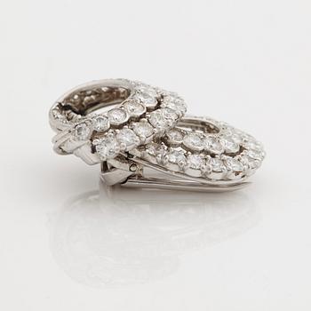 A 1940/50's clip brooch by Cartier, Paris set with brilliant cut diamonds.