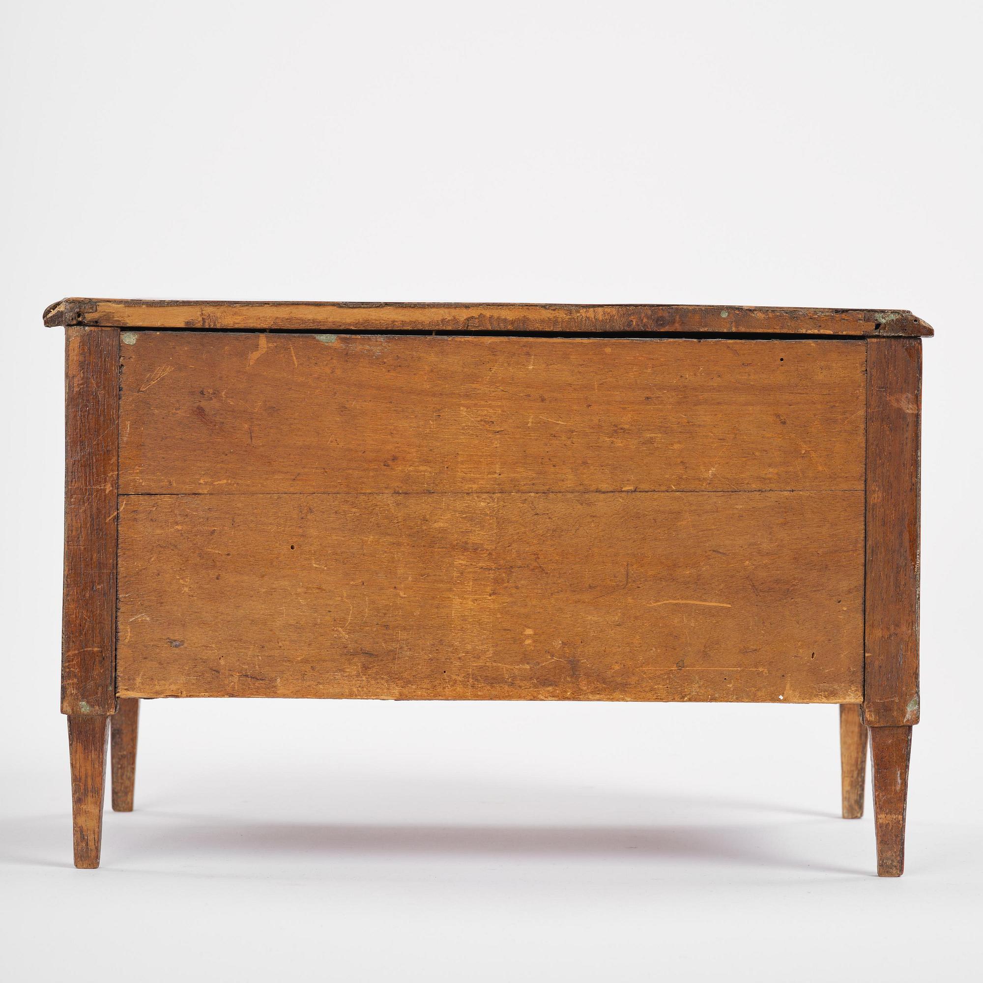 A presumably Italien Louis XVI miniature commode.