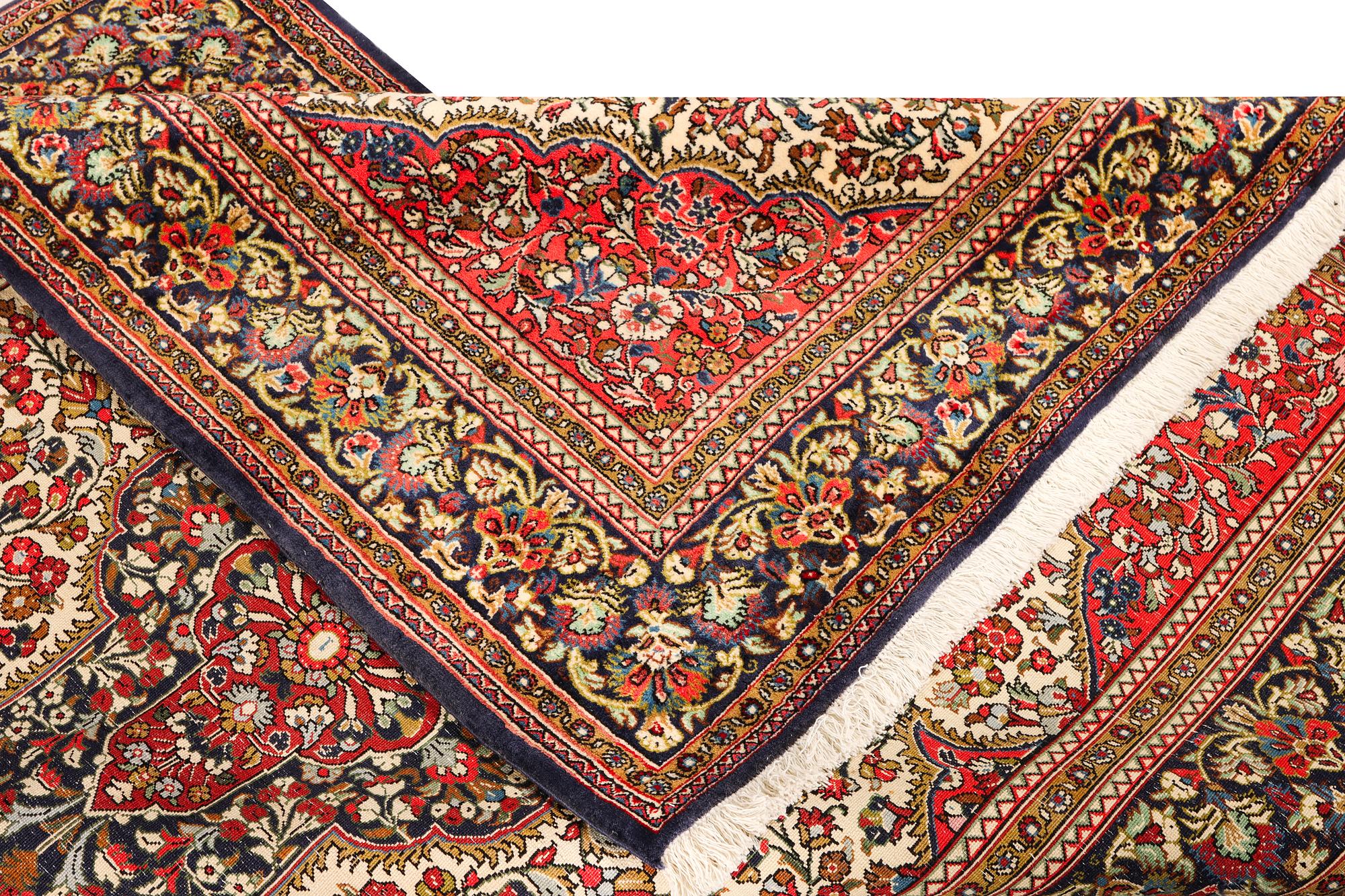 A Ghom rug, c. 202 x 137 cm.