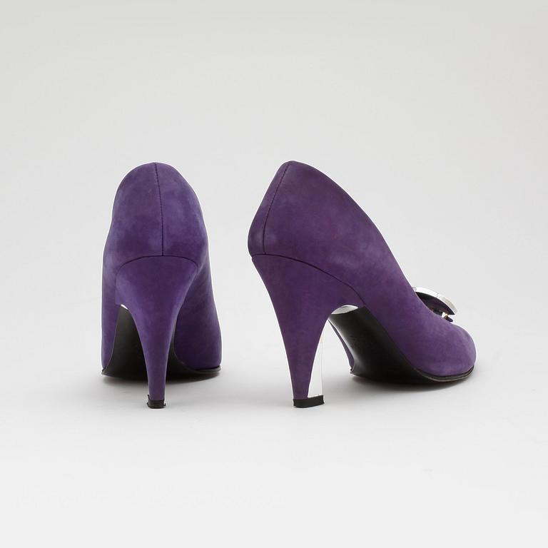 CHARLES JOURDAN, a pair of purple leather pumps.