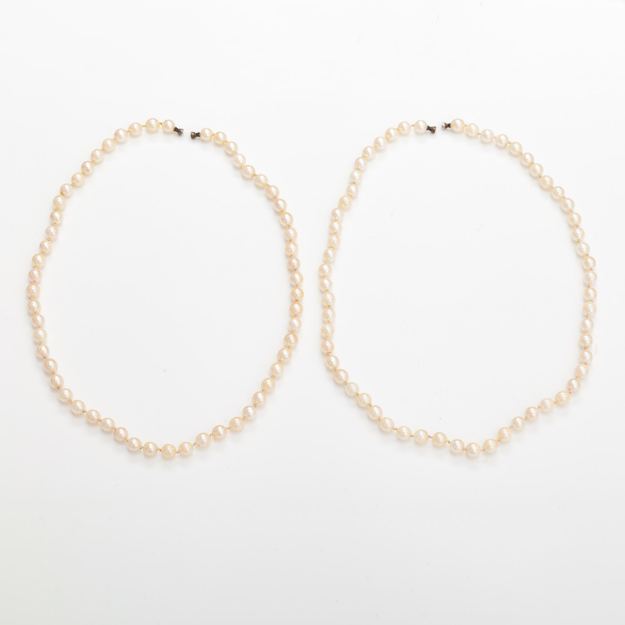 Two cultured pearl colliers without locks, silver parts. Probably Ole Lynggaard.