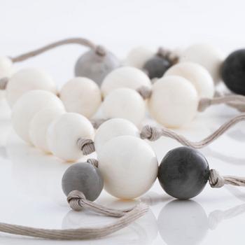 A quartz and mother of pearl necklace by Ole Lynggaard.