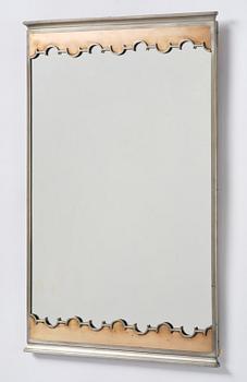 Nils Fougstedt, a rare pewter and brass wall mirror model A 679, Firma Svenskt Tenn, Stockholm, 1932.