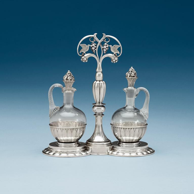 A Georg Jensen 830/1000 silver cruet-stand, Copenhagen 1921.