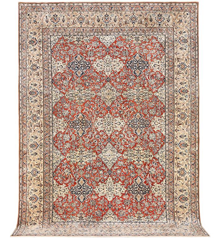 A semi-antique/old Nain carpet, part silk, c. 343 x 230 cm.