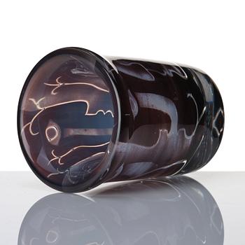 Ingeborg Lundin, an 'ariel' burgundy coloured glass vase decorated with faces, Orrefors Sweden 1972.