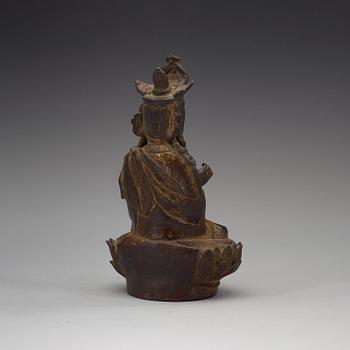 A bronze figure of Guanyin, late Ming dynasty (1368-1644).