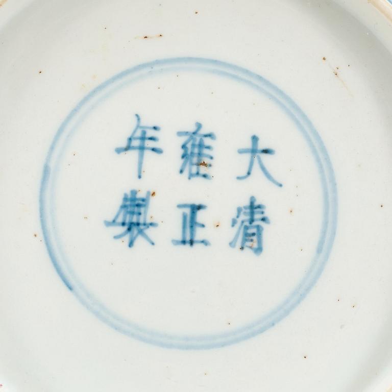A blue and white dish with a red four clawed dragon, Qing dynasty (1644-1912), with Yongzheng six character mark.