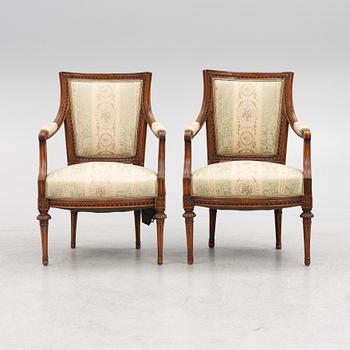 A pair of late Gustavian open armchairs, Stockholm, late 18th century.