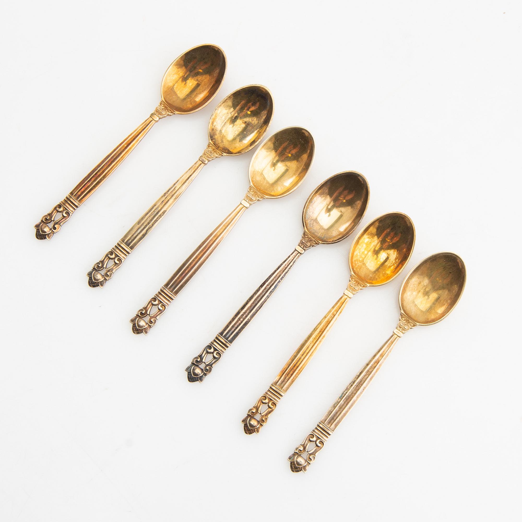 Johan Rohde, spoons 12 pcs "Konge/Achorn" sterling silver for Georg Jensen after 1945.