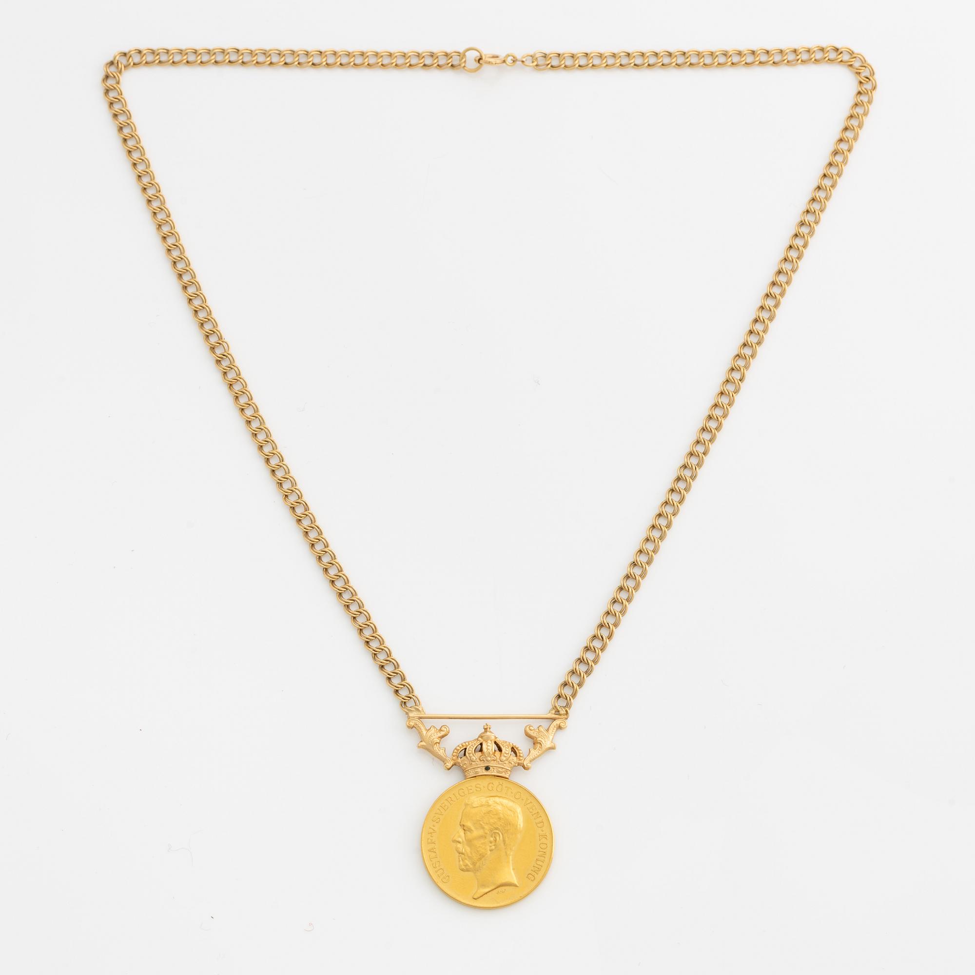 Medalj, "för nit och redlighet i rikets tjänst", guld, med senare kedja i 18K guld.