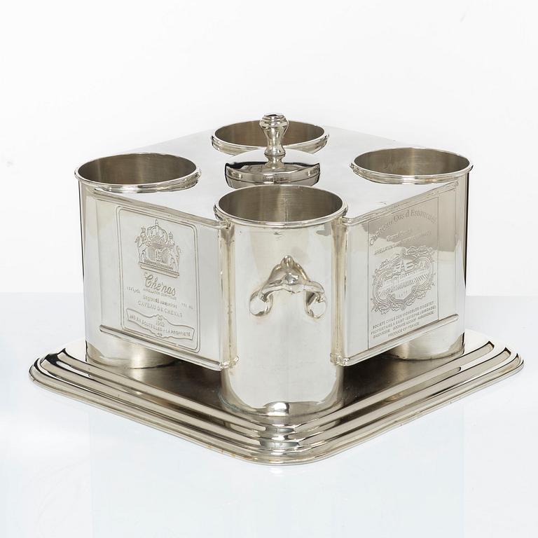 A silver plated four-bottle wine cooler.