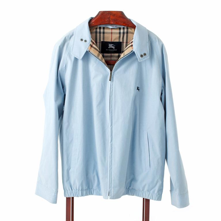 BURBERRY, a light blue cottonjacket.