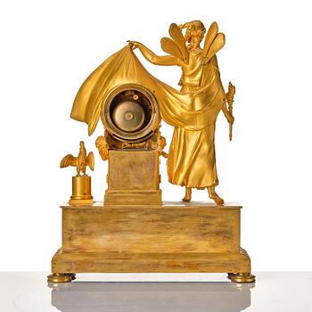 A French Empire mantel clock. Marked "LE NEPVEU A PARIS".