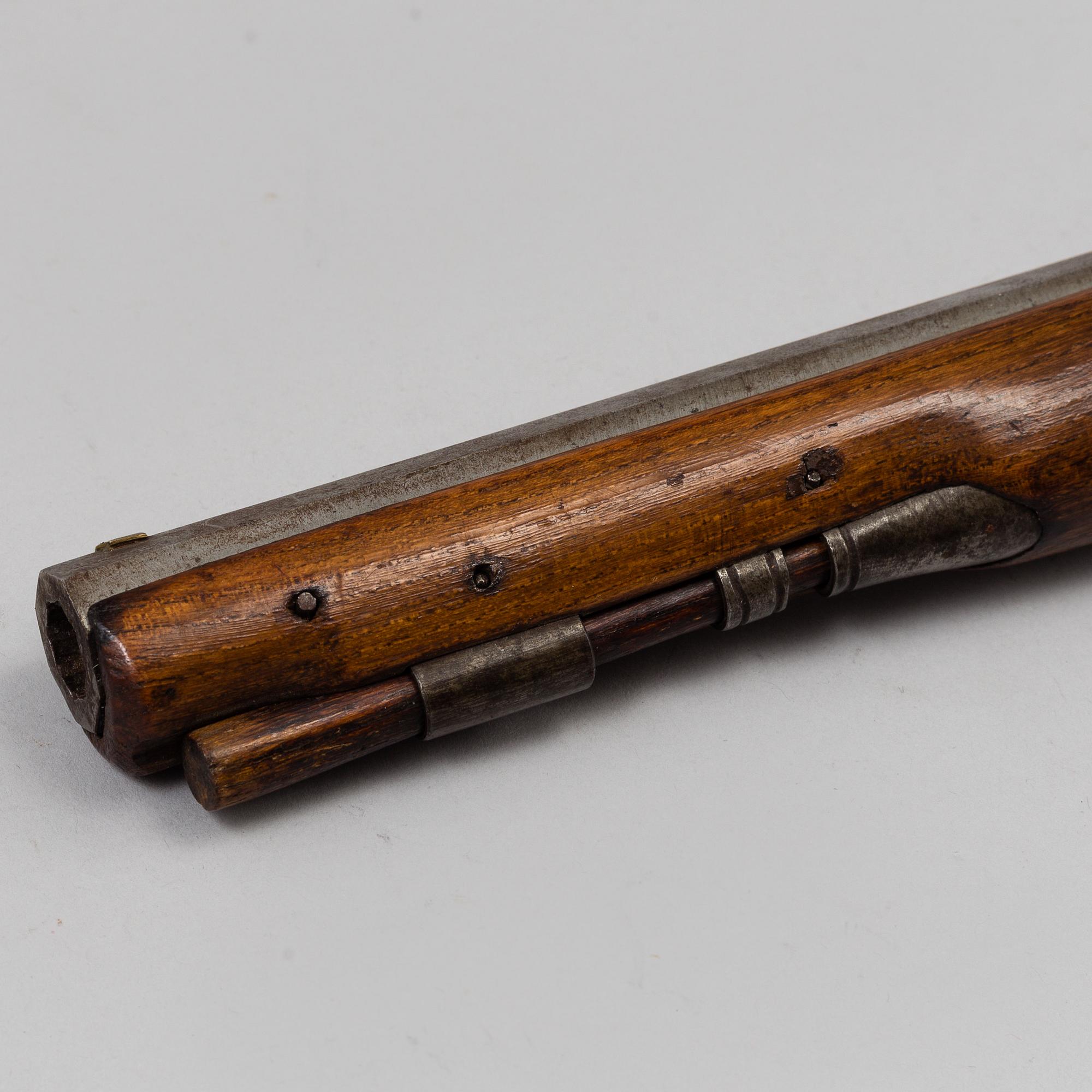 One flint lock postol, late 18th ct, and one percussion pistol, 19th ct.