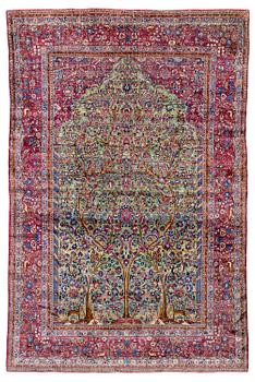 392. An antique silk Kashan carpet, central Persia, c. 319 x 206 cm.