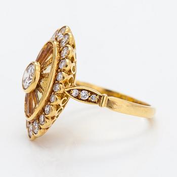 Ring, 18K guld, diamanter ca 1.10 ct totalt och gula safirer.