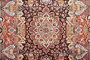 A Kashmar carpet, a. 300 x 200 cm.