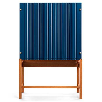 141. Josef Frank, a blue lacquered cabinet on stand, model nr 2192, by Svenskt Tenn, Sweden.