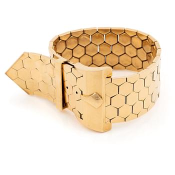 497. A bracelet 18K gold in the form of a belt.