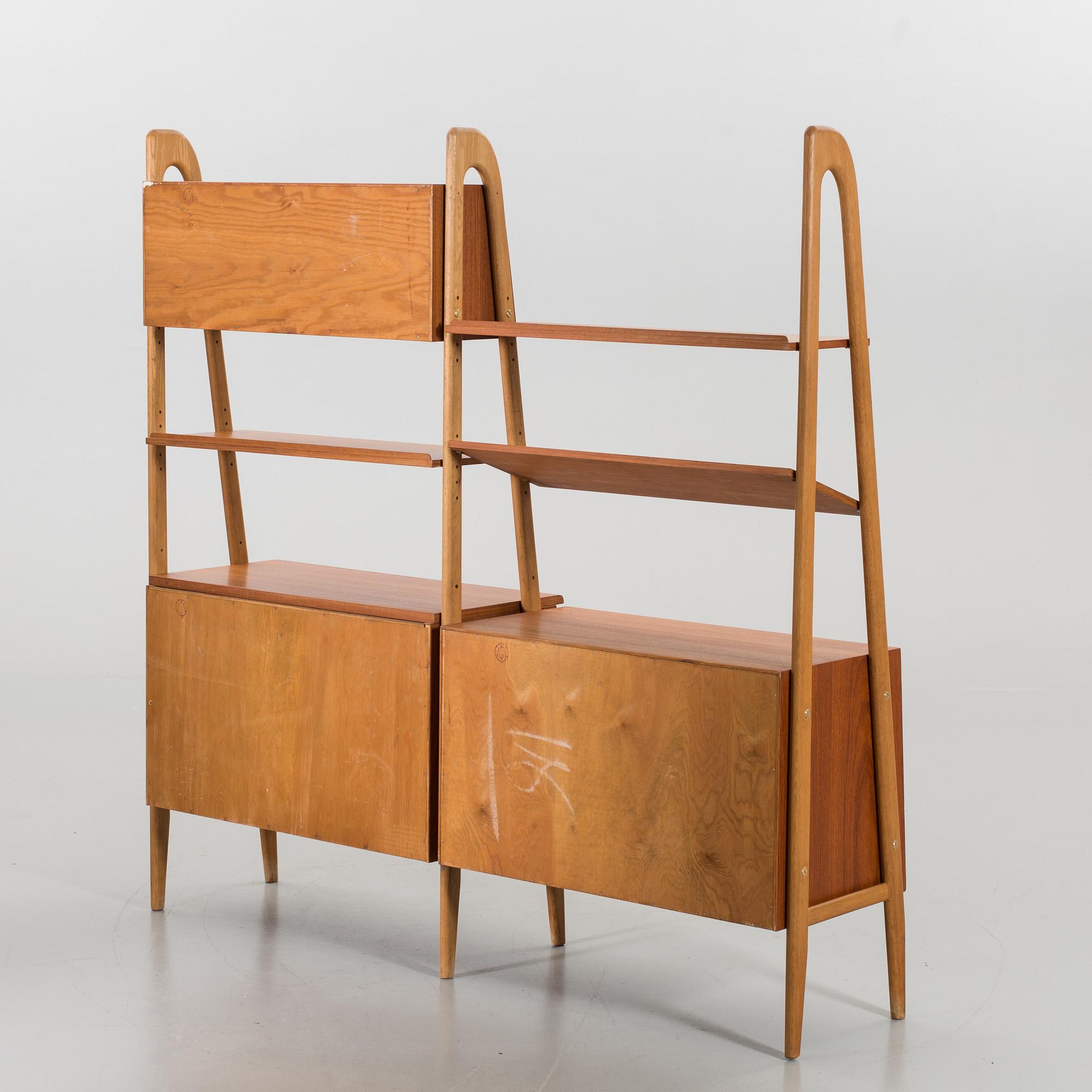 TWO TEAK AND OAK BOOKSHELVES, second half of the 20th century.