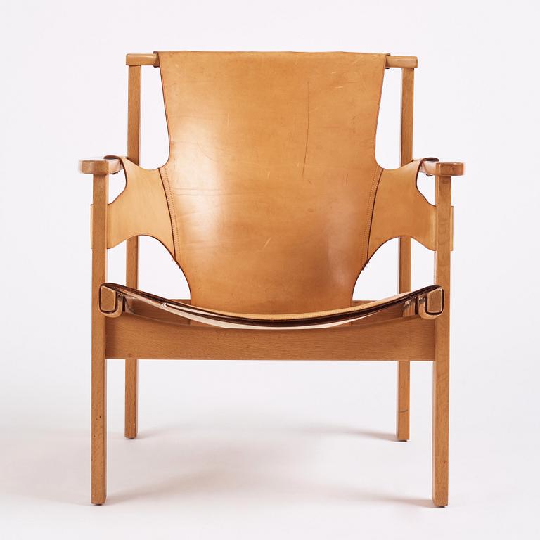 Carl-Axel Acking, a Swedish Modern oak and natural brown leather 'Trienna' chair, Nordiska Kompaniet.