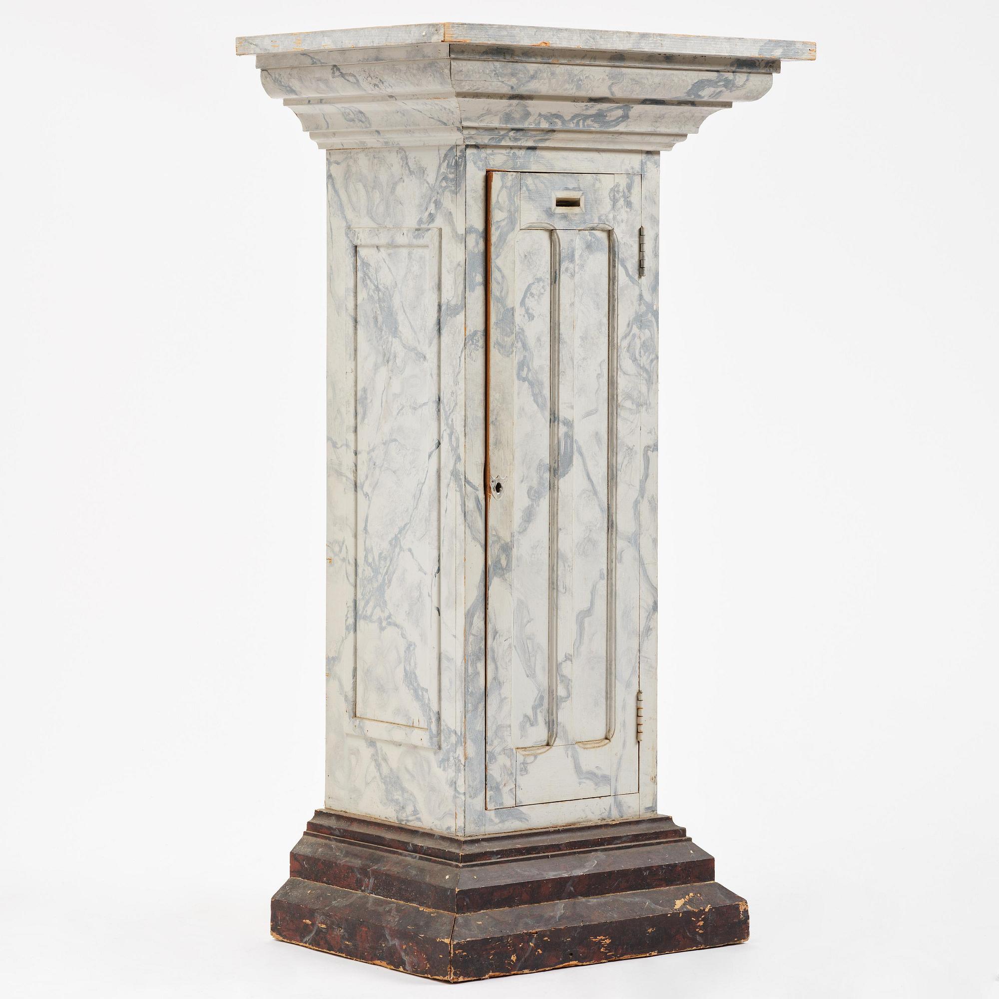 A Swedish column-shaped cabinet late 19 th century.
